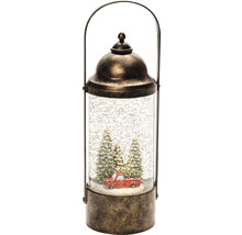 Decoratieve sneeuwbol lantaarn met rode pick-up en kerstbomen