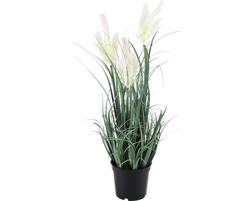 Decoratieve kunstplant in pot met gras en bloeiwijzen