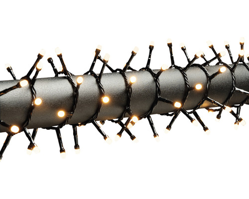 KONSTSMIDE Kerstverlichting LED lichtsnoer 200 lampjes frost extra warmwit 4,38 m Slingers met warmwitte lichten rond een paal gewikkeld