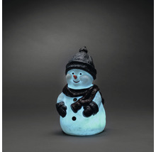 Decoratieve sneeuwpop met muts en sjaal als verlichte figuur