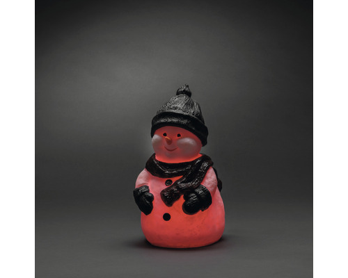 Decoratieve sneeuwpop met muts en sjaal als sfeervolle kerstverlichting