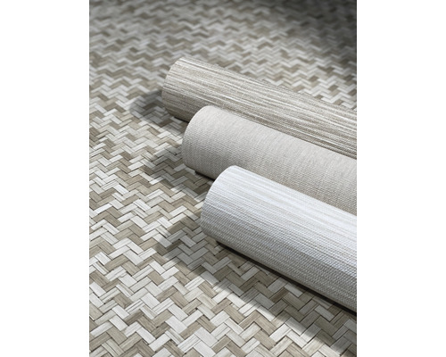 Drie rollen textielbehang op een geweven achtergrond