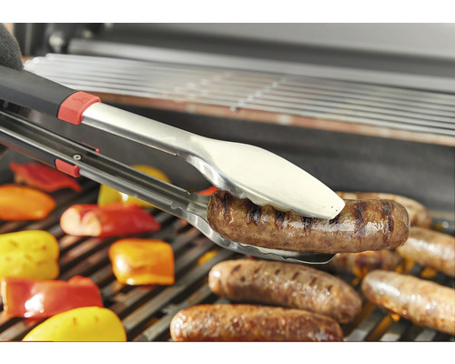 Barbecuetang houdt worst boven grillrooster