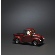 Decoratieve kersttruck met kerstmanfiguur voor feestelijke decoraties