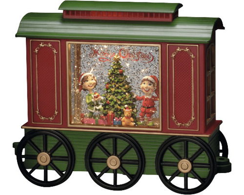 Decoratieve kersttrein met sneeuwbol, kerstboom en figuren als feestelijke decoratie