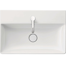 Bovenaanzicht van een witte wastafel met kraan