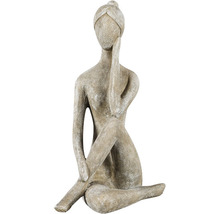 Decoratief beeld van een zittende vrouw