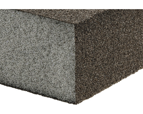 Close-up van een schuurblok met twee verschillende schuuroppervlakken