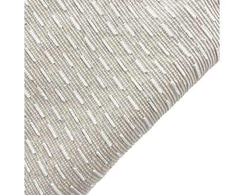 Close-up van een kussen met stikpatroon