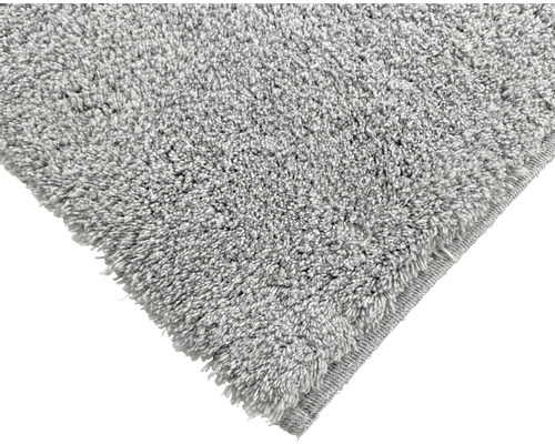 Detailopname van een grijs tapijt met pool