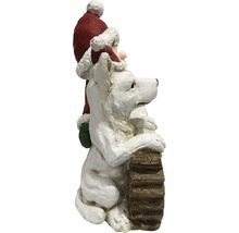 Decoratief figuur kerstman met hond op houten stam