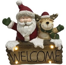 Kerstdecoratie met kerstman, rendier en welkomstbord