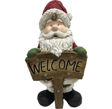 Kerstmanfiguur met welkomstbord als decoratie voor buiten
