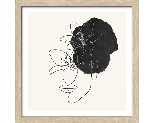 Ingelijste foto met lijntekening van gezicht en bloem