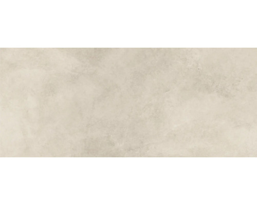 Detailweergave van een heldere wandtegel met structuur.