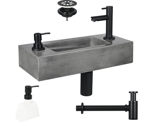 Betonnen opzetwastafel met kraan, zeepdispenser, afvoergarnituur en sifon