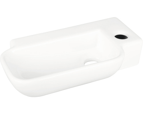 Witte keramische fontein met kraangat