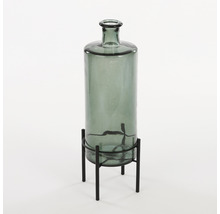 Decoratieve glazen fles op een metalen standaard