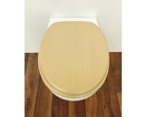 Toiletbril met houten decor op toilet