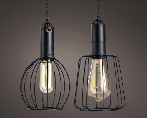 Twee hanglampen met Edison-lampen in zwarte metalen kooien