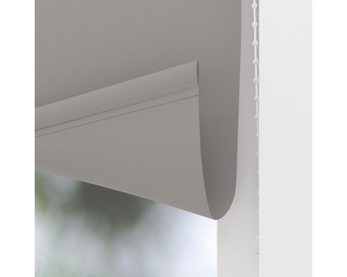 Grijs rolgordijn voor raam