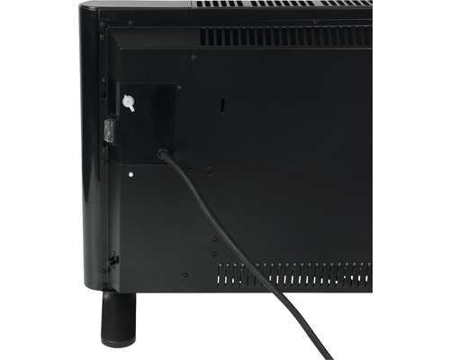 Achterkant van een zwarte convectorkachel met stroomkabel