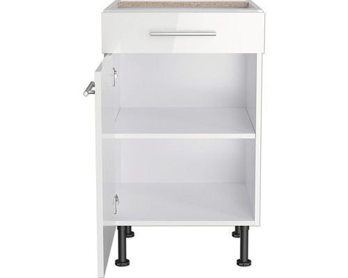 Witte onderkast met lade en open deur