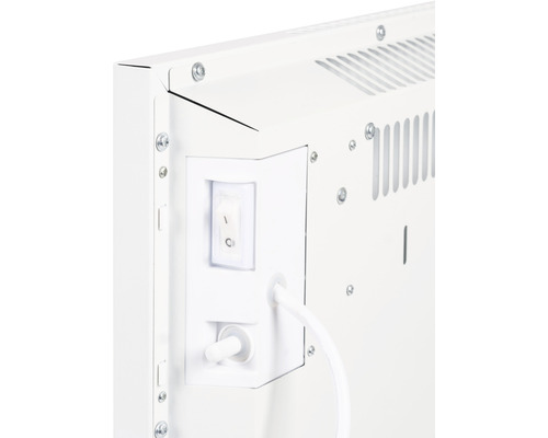 Detail van een radiator met schakelaar en kabel