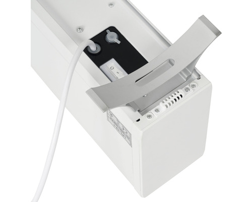 Detailopname van een projectiescherm met open behuizing en zichtbare stroomaansluiting