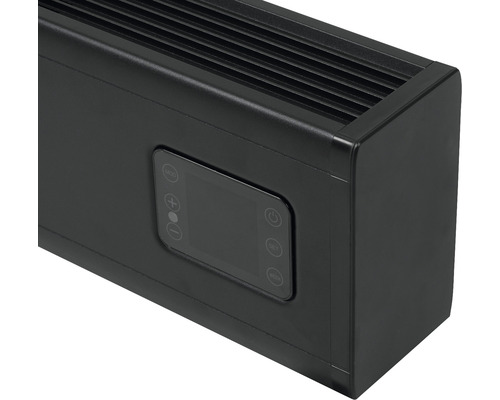 Detailweergave van een zwarte verwarming met bedieningselementen