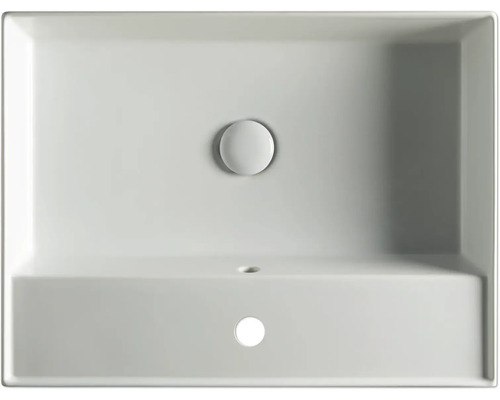 Bovenaanzicht van een rechthoekige wastafel van keramiek met afvoergarnituur