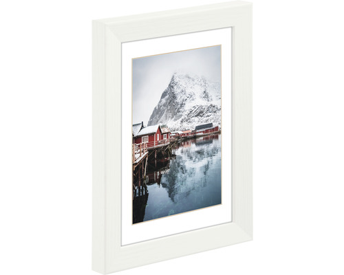 Fotolijst met foto van een bergstad in de winter