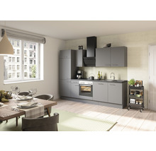 Lichte keuken met eettafel en grijze keukenkasten