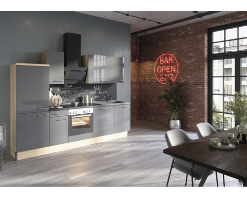 OPTIFIT Keukenblok met apparatuur Jonte984 antraciet mat 270x60 cm Moderne keuken met grijze kasten, eethoek en decoraties in een lichte ruimte.
