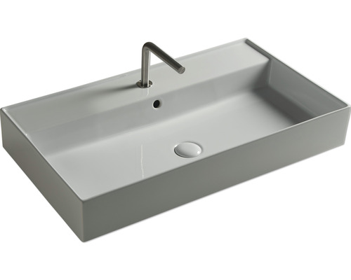 Rechthoekige keramische wastafel met kraan