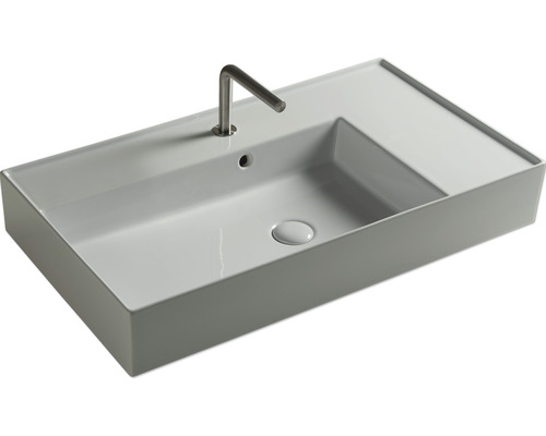 Rechthoekige wastafel van keramiek met kraan