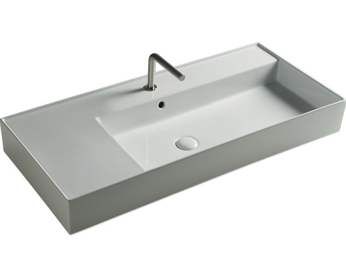 Rechthoekige wastafel van sanitair keramiek met kraan