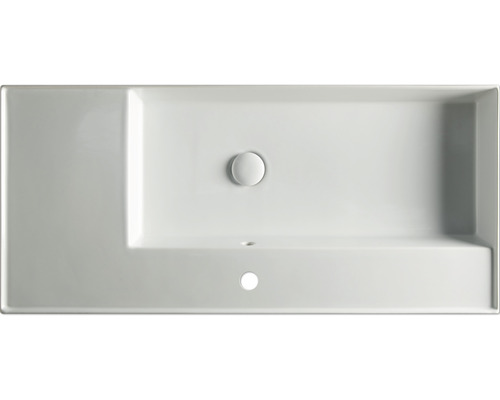 Bovenaanzicht van een rechthoekige wastafel met overloop