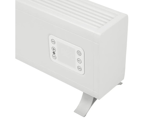 Detailopname van een witte radiator met bedieningspaneel en poten.