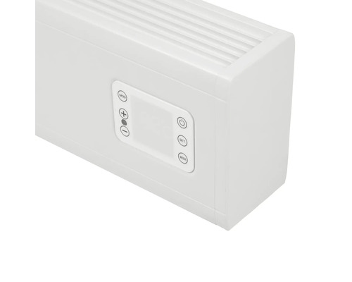 Detailweergave van een witte radiator met bedieningspaneel.