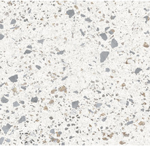 Close-up van een vloertegel met terrazzo patroon