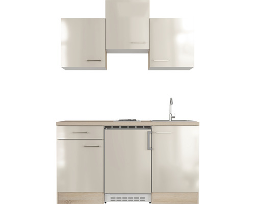 Compacte keuken met gootsteen, kraan, onderkasten en bovenkasten