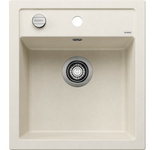 Spoelbak van materiaal in beige met afvoergarnituur en Blanco logo