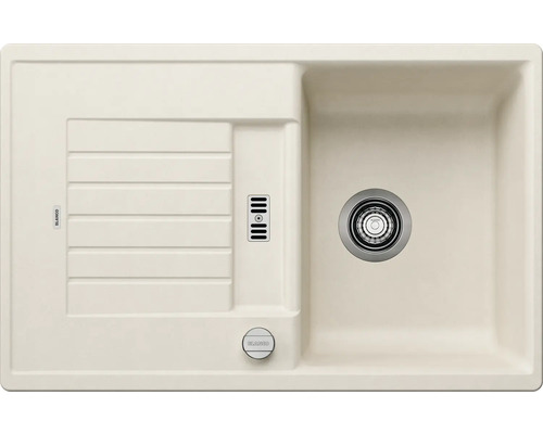 Beige aanrechtbak met afdruiprek en afloopbediening