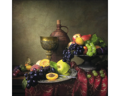 Stilleven met fruit, wijnkruik en kelk op een tafel