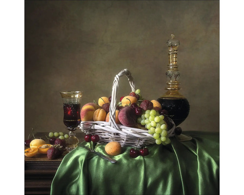 Stilleven met fruitmand, drank en karaf