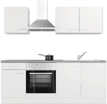 Keuken met spoelbak, fornuis, oven, afzuigkap en bovenkasten