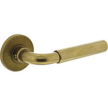 Metalen deurklink met ronde rozet