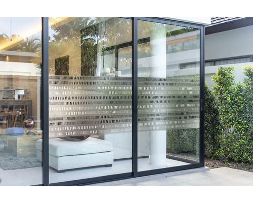 Glasdecoratiefolie met streepjesmotief op een glazen schuifdeur