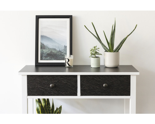 Decoratieve consoletafel met laden, fotolijst en planten